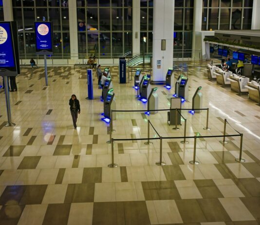 공항 입국 때 ‘이것’ 확인하세요…반입금지 물품 등 집중단속 a man is walking through an airport terminal