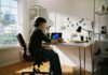 디지털 디톡스, 당신의 삶에 여유를 더하다 Person working at desk with laptop and phone.